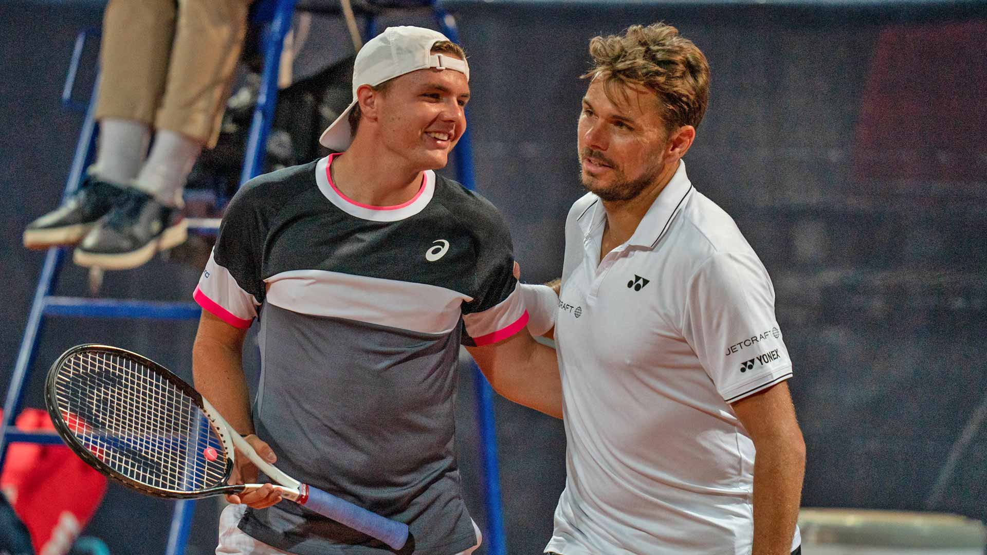 <a href='https://edx.atptour.com/en/players/dominic-stricker/s0la/overview'>Dominic Stricker</a> and <a href='https://edx.atptour.com/en/players/stan-wawrinka/w367/overview'>Stan Wawrinka</a>