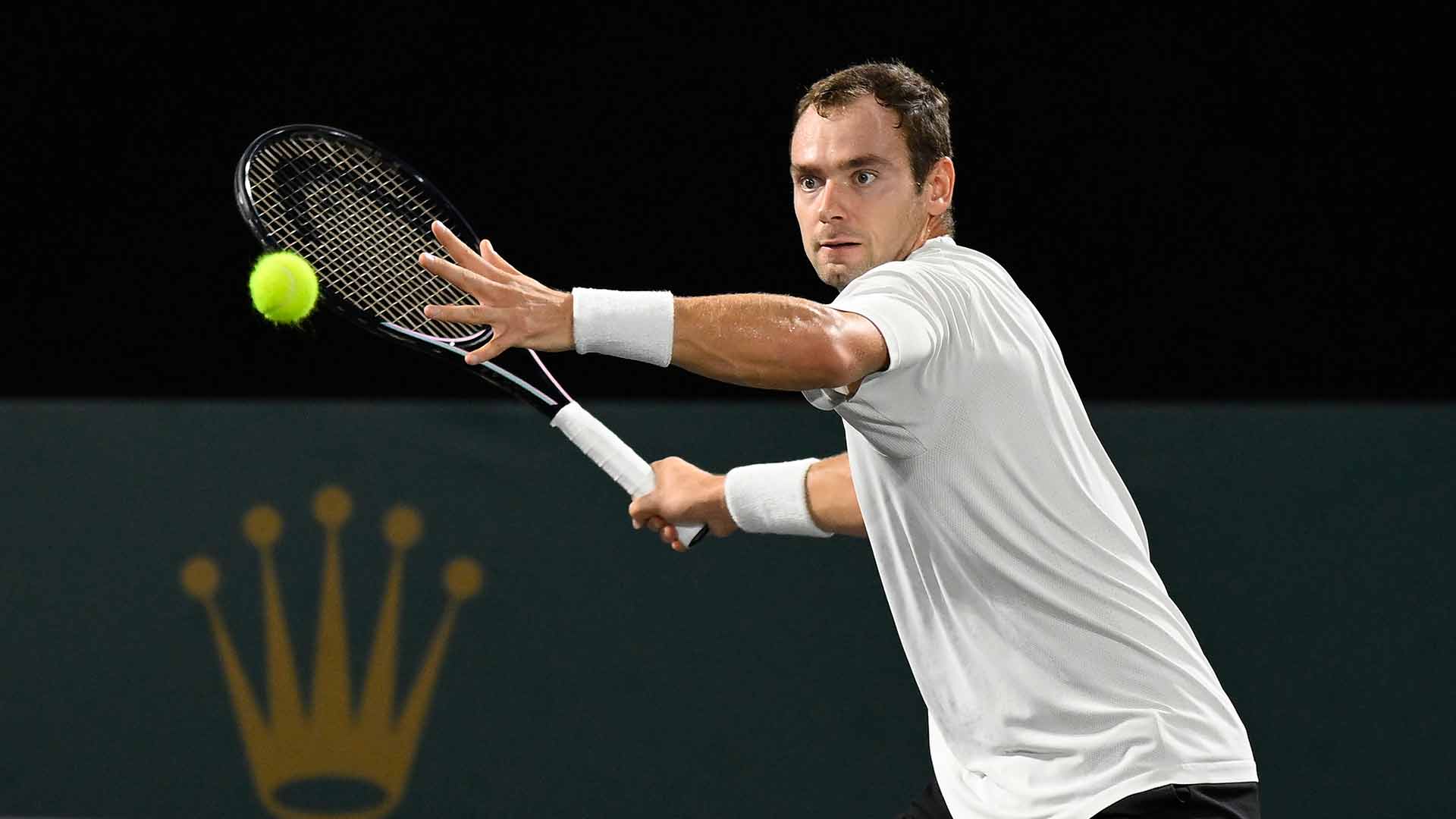 Roman Safiullin defeats Alexandre Muller in straight sets to reach the second round of the Rolex Paris Masters.