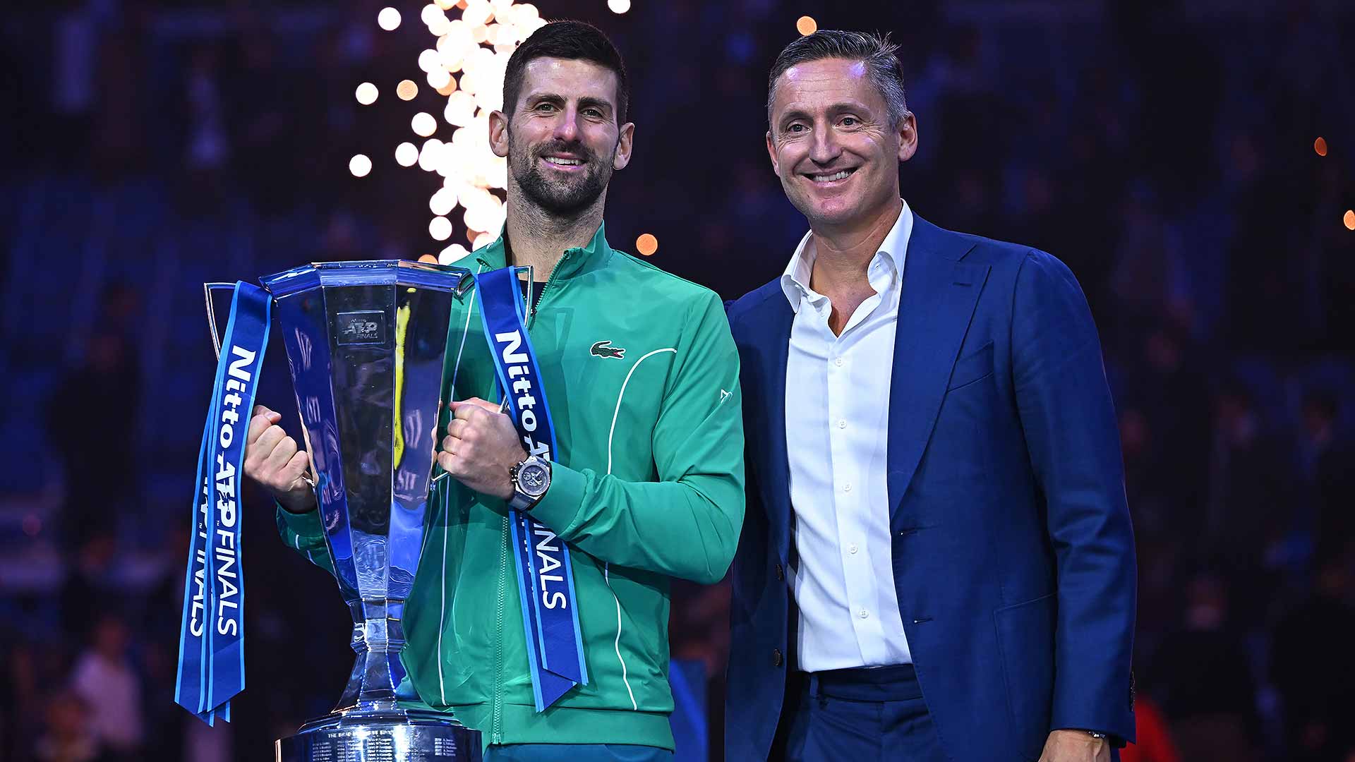 <a href='https://edx.atptour.com/en/players/novak-djokovic/d643/overview'>Novak Djokovic</a> celebrates his seventh <a href='https://edx.atptour.com/en/tournaments/nitto-atp-finals/605/overview'>Nitto ATP Finals</a> title with ATP Chairman <a href='https://edx.atptour.com/en/players/andrea-gaudenzi/g254/overview'>Andrea Gaudenzi</a>.