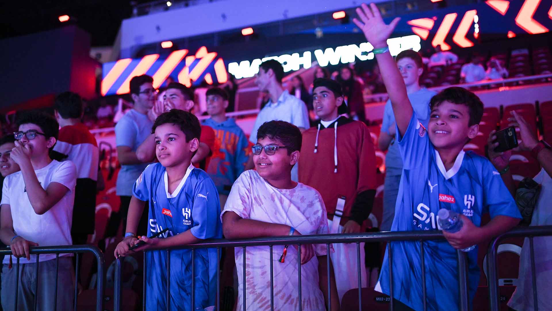 Young fans enjoying the Next Gen ATP Finals.