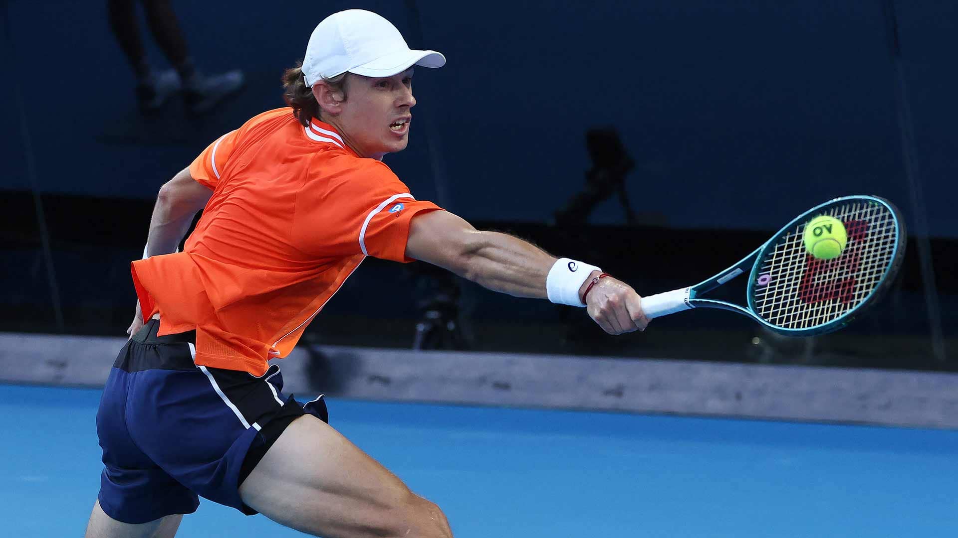 Alex de Minaur in action against Milos Raonic on Monday in Melbourne.