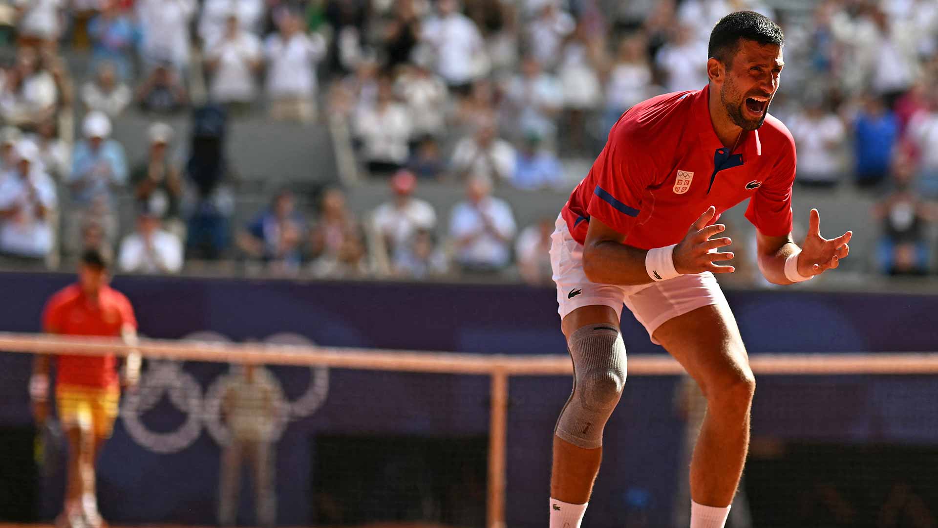 <a href='https://edx.atptour.com/en/players/novak-djokovic/d643/overview'>Novak Djokovic</a> celebrates the moment he clinches the gold medal at the <a href='https://edx.atptour.com/en/scores/archive/paris/96/2024/results'>Paris Olympics</a>.