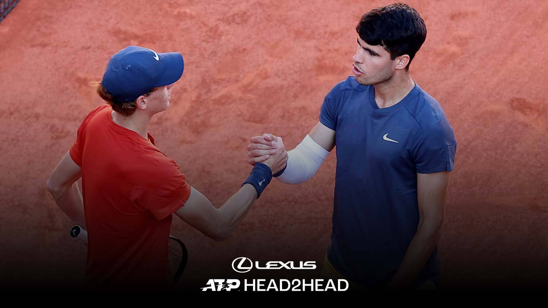 Jannik Sinner and Carlos Alcaraz shake hands after their five-set clash in the 2024 Roland Garros semi-finals.