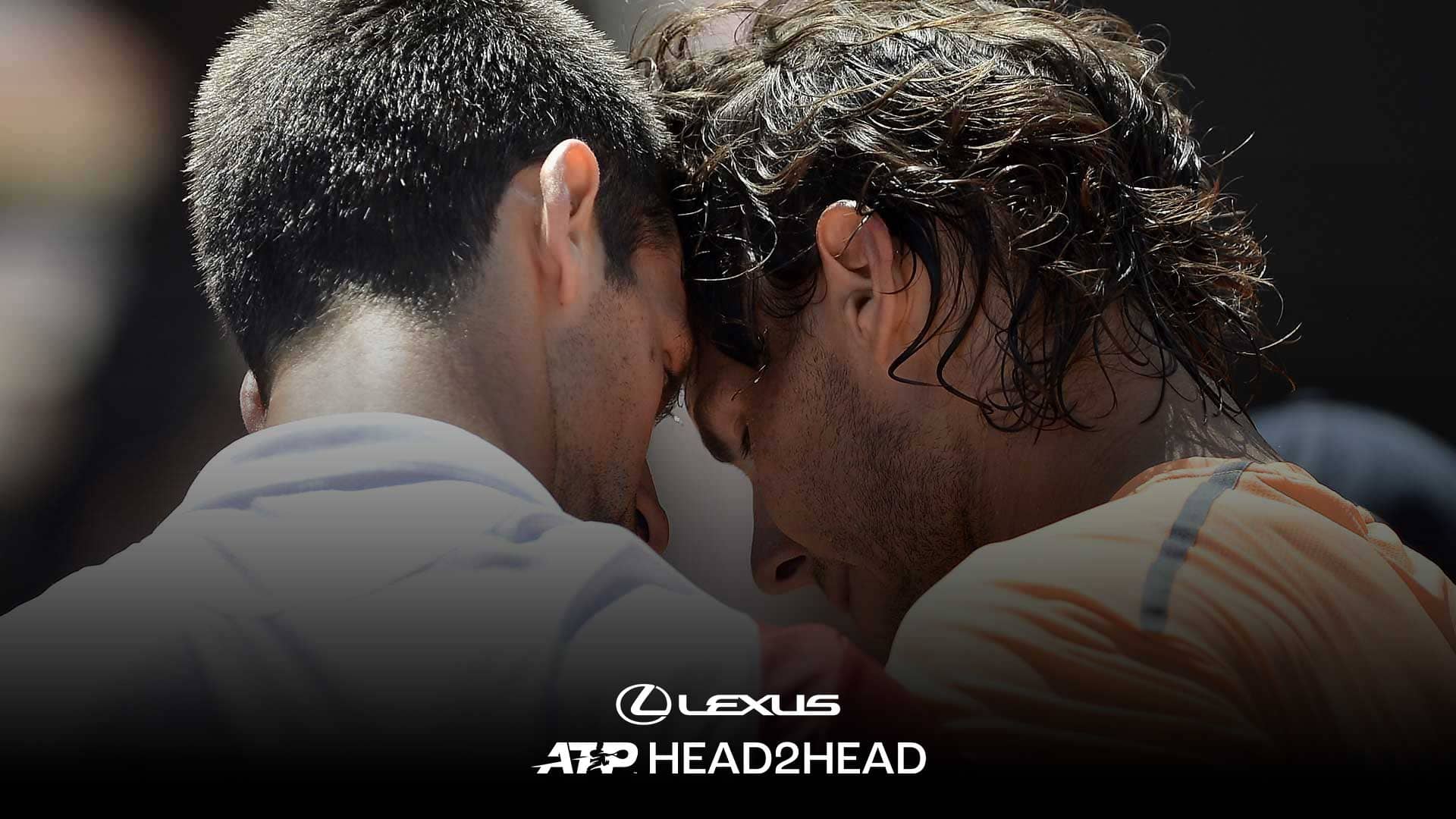 Novak Djokovic and Rafael Nadal following a battle.