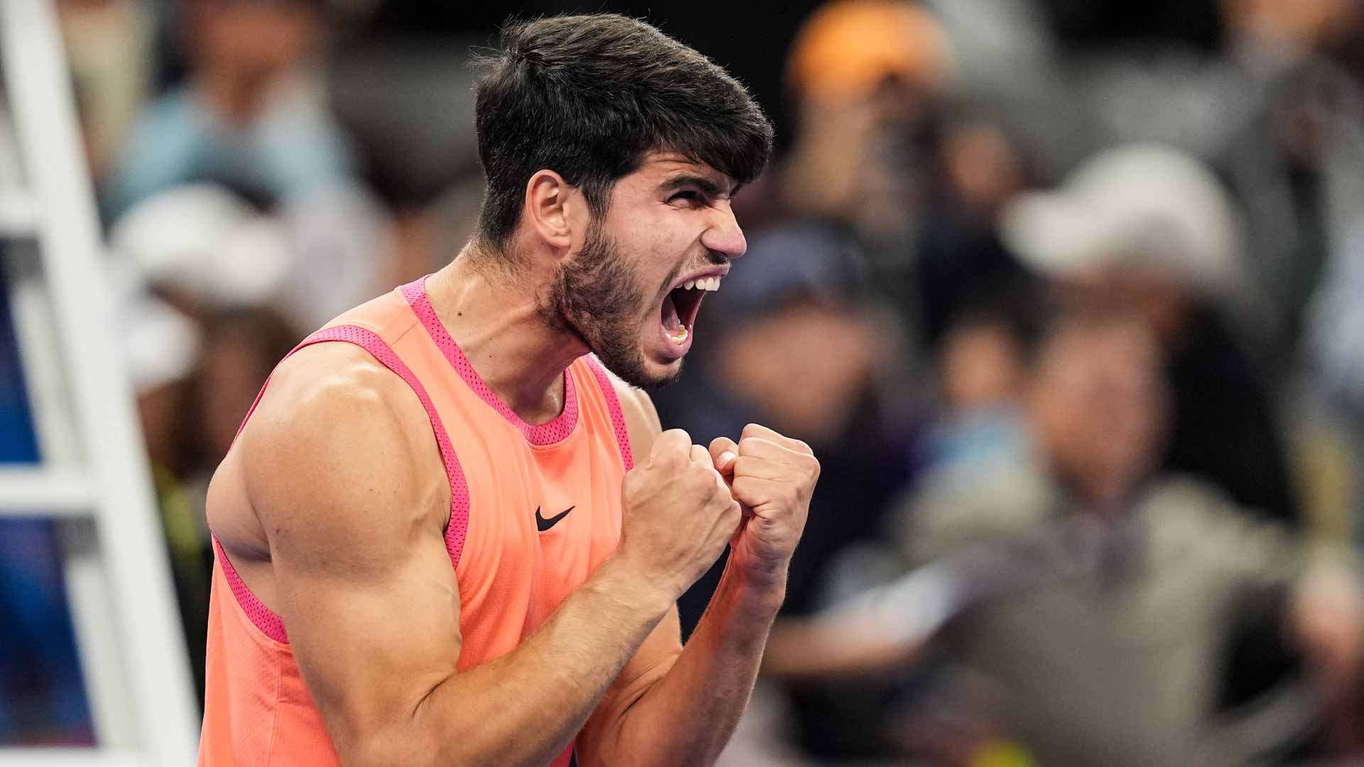 Carlos Alcaraz celebrates his three-hour, 21-minute final victory against Jannik Sinner in Beijing.